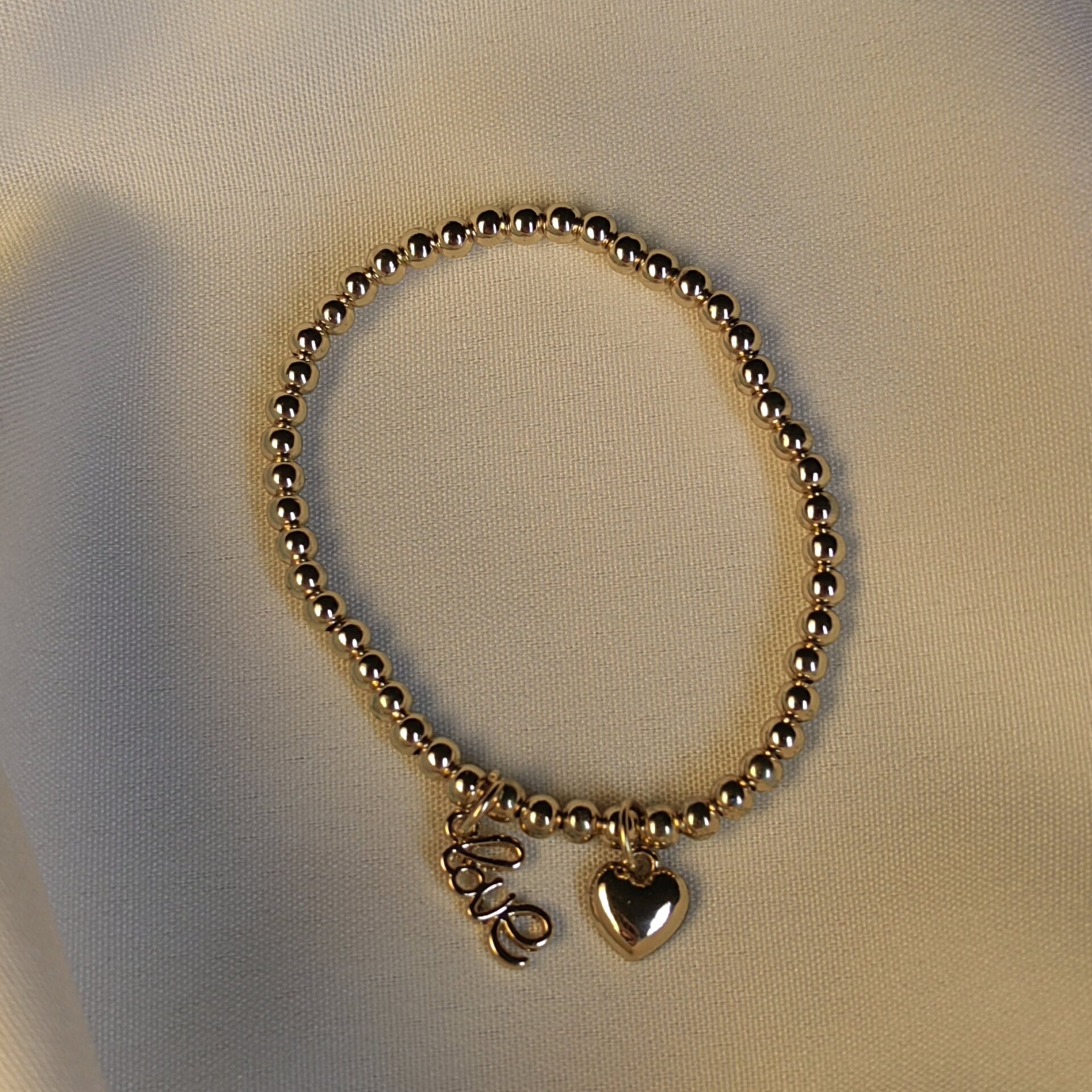  دستبند استیل آویز قلب و لاو 